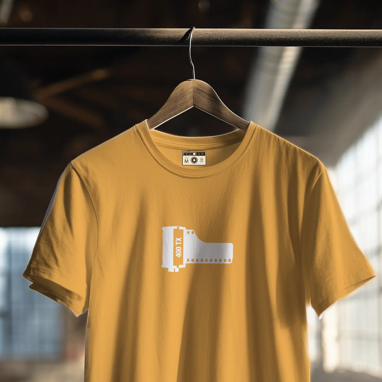 CAMISETA TX 400 Camiseta con una ilustración de un carrete clásico de fotografía.